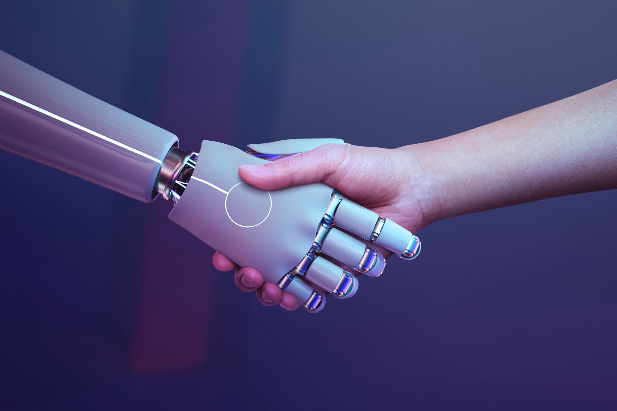 Handschlag zwischen menschlicher- und Roboterhand